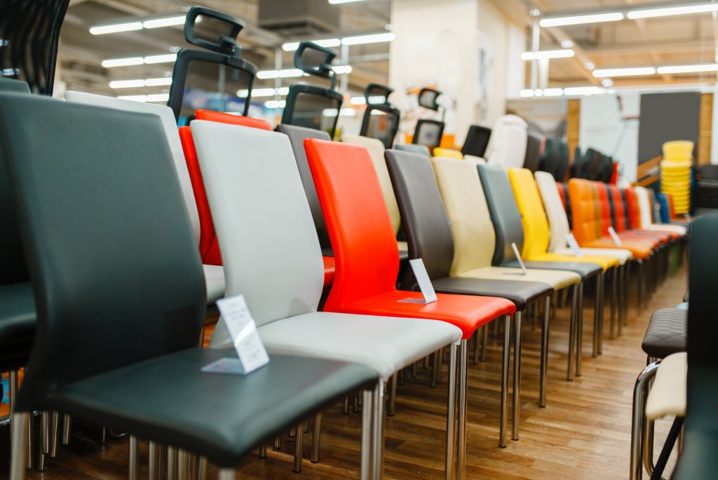 Rows of chairs in furniture store showroom